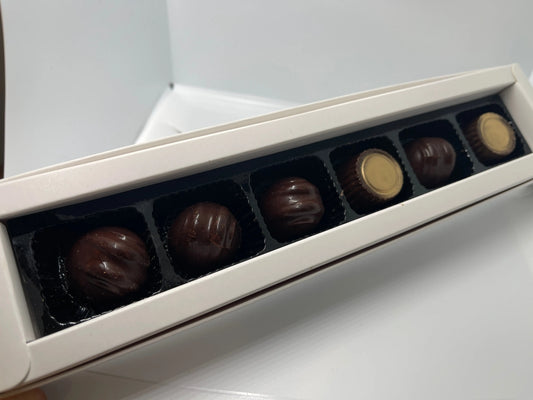 54% cacao Dark chocolate bonbon praline with orange liqueur ganache mix